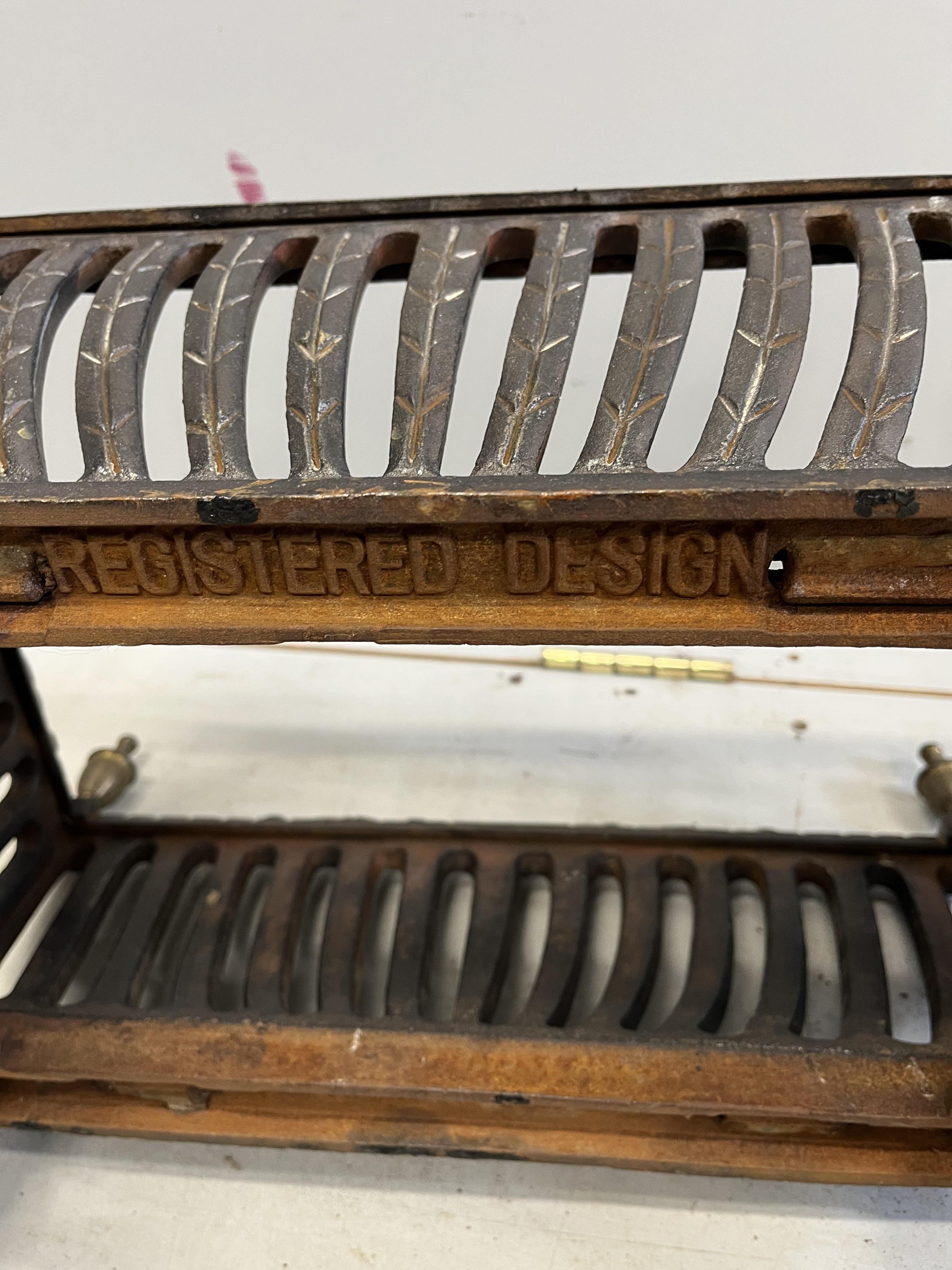 Two fireguards and a fire basket, largest fireguard, width 121cm, depth 31cm, height 66cm, inside measurement 108cm